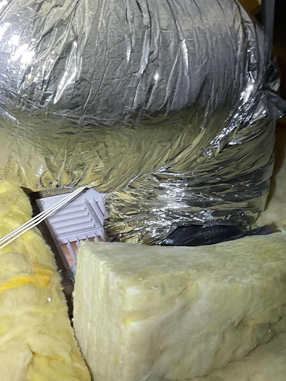Heating duct loose and disconnected above the ceiling, found during a pre-handover (PCI) inspection in Manor Lakes