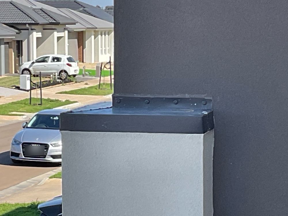 Wall flashing fixed too far apart, with no over flashing above it, found during a pre-handover (PCI) inspection in Manor Lakes